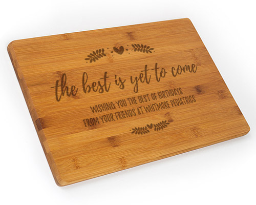 https://northwestgifts.com/product_images/uploaded_images/personalized-cutting-board-50th-birthday-gift-for-her.jpg